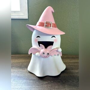 Ghost with witch hat and pink bat
